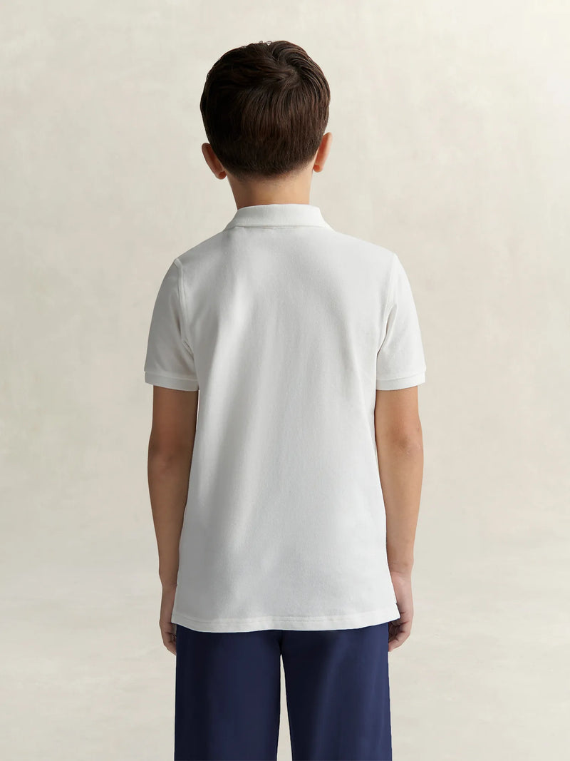 Rear view of the GANT white polo shirt.