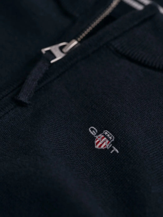 Closer view of the GANT shield half zip sweatshirt.