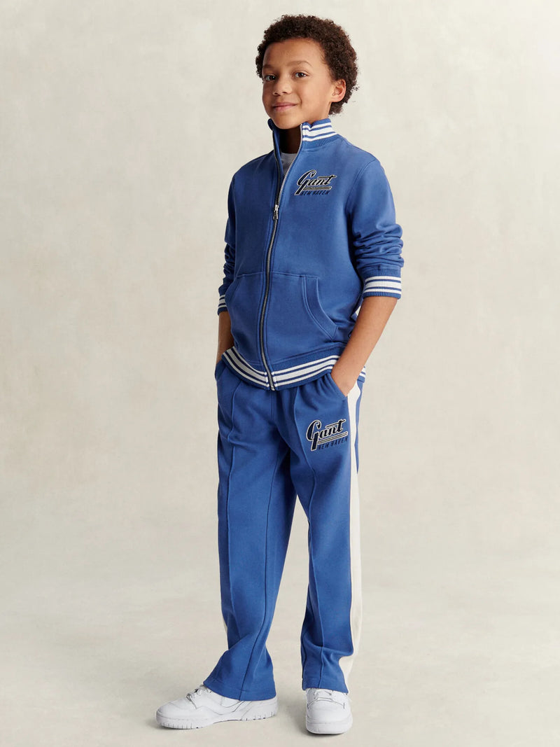 Smiling Boy modelling the GANT zip up sweatshirt.