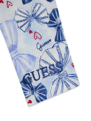 Closer look at the Guess bow leggings showing detail of the blue glitter logo at the ankle.