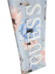 Closer look at the Guess butterfly leggings showing detail of the silver glitter logo.