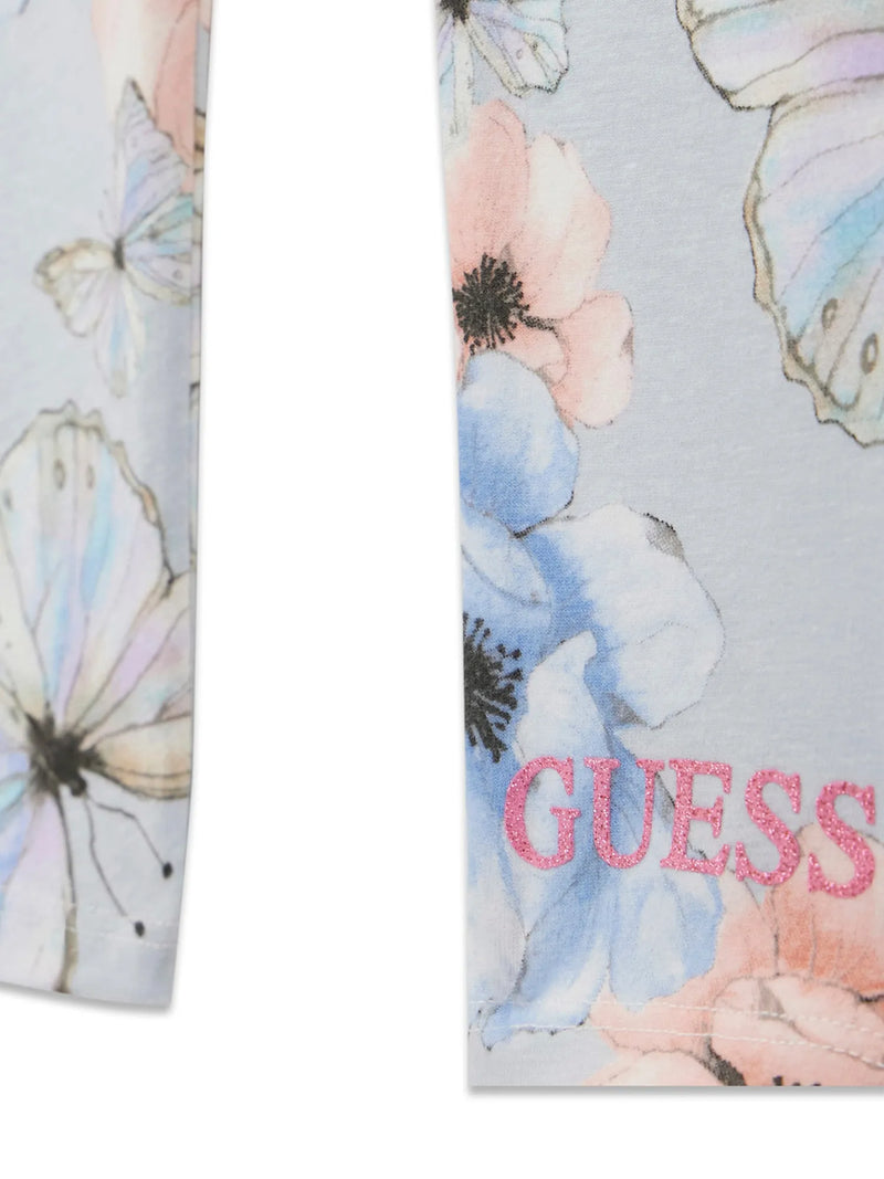 Closer look at the Guess butterfly leggings showing detail of the pink glitter logo at the ankle.