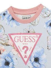Closer look at the Guess butterfly sweatshirt showing detail of the pink glitter triangle logo.