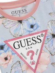 Closer look at the Guess butterfly t-shirt showing detail of the pink glitter triangle logo.