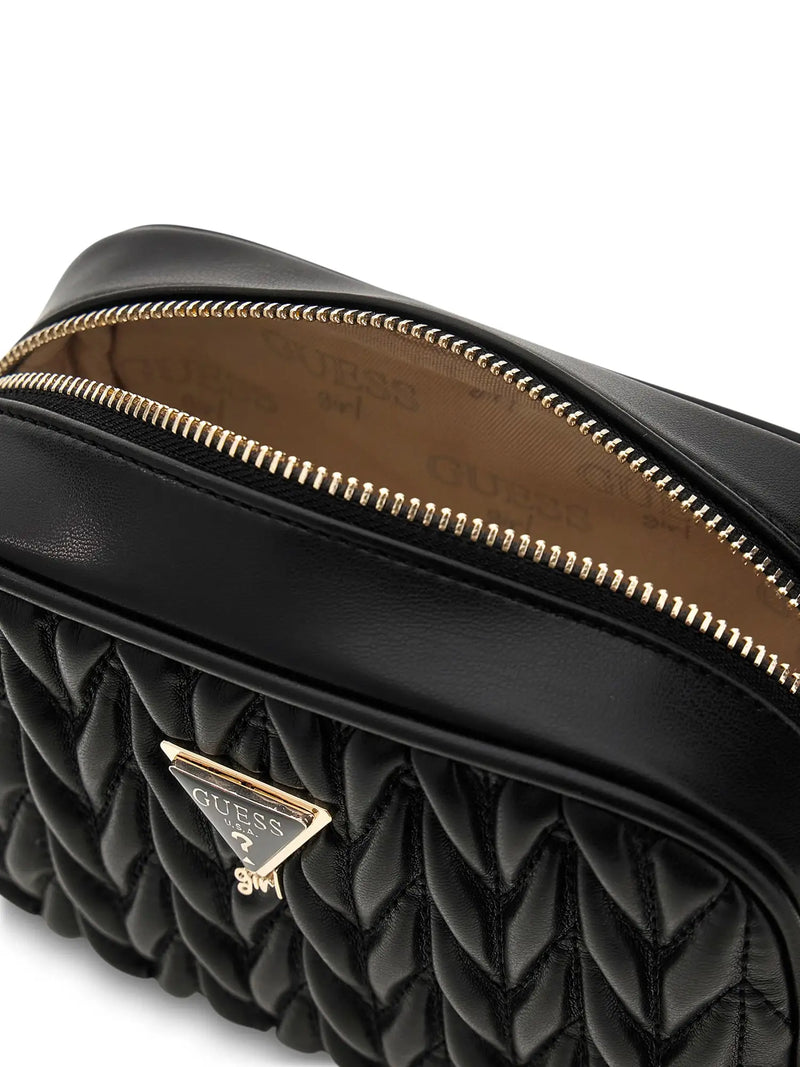 Closer look at the Guess camera bag showing detail of the black and gold triangle logo.