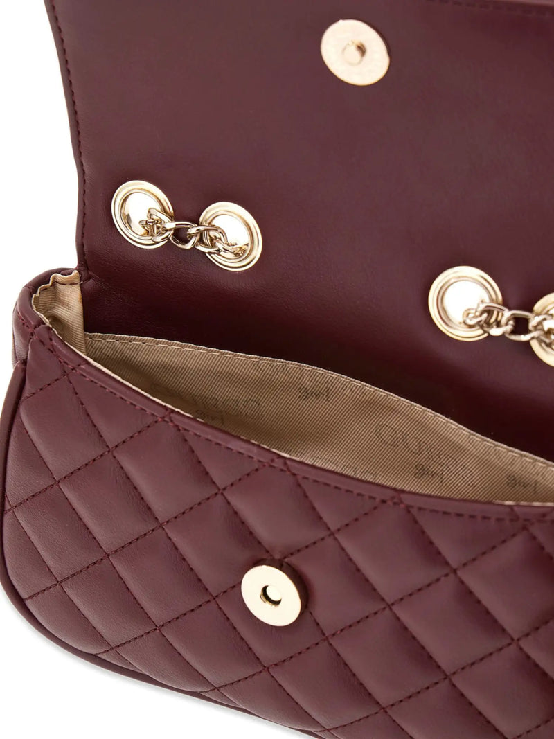 Closer look at the Guess crossbody bag showing detail of the diamond stitching.