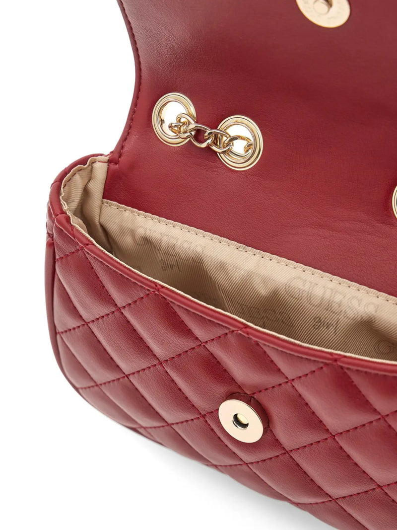 Closer look at the Guess crossbody bag showing detail of the diamond stitching.