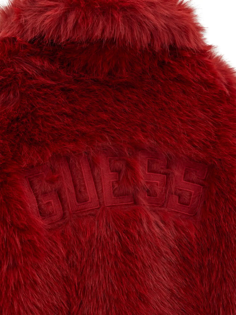 Closer look at the Guess faux fur jacket showing detail of the embroidered logo on the back.