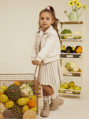 Girl wearing the Guess Faux Leather Skirt.