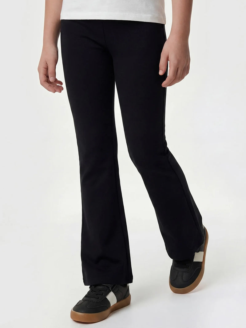 Closer view of the Guess flared leggings.
