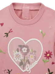 Closer look at the detail of the heart logo patch.