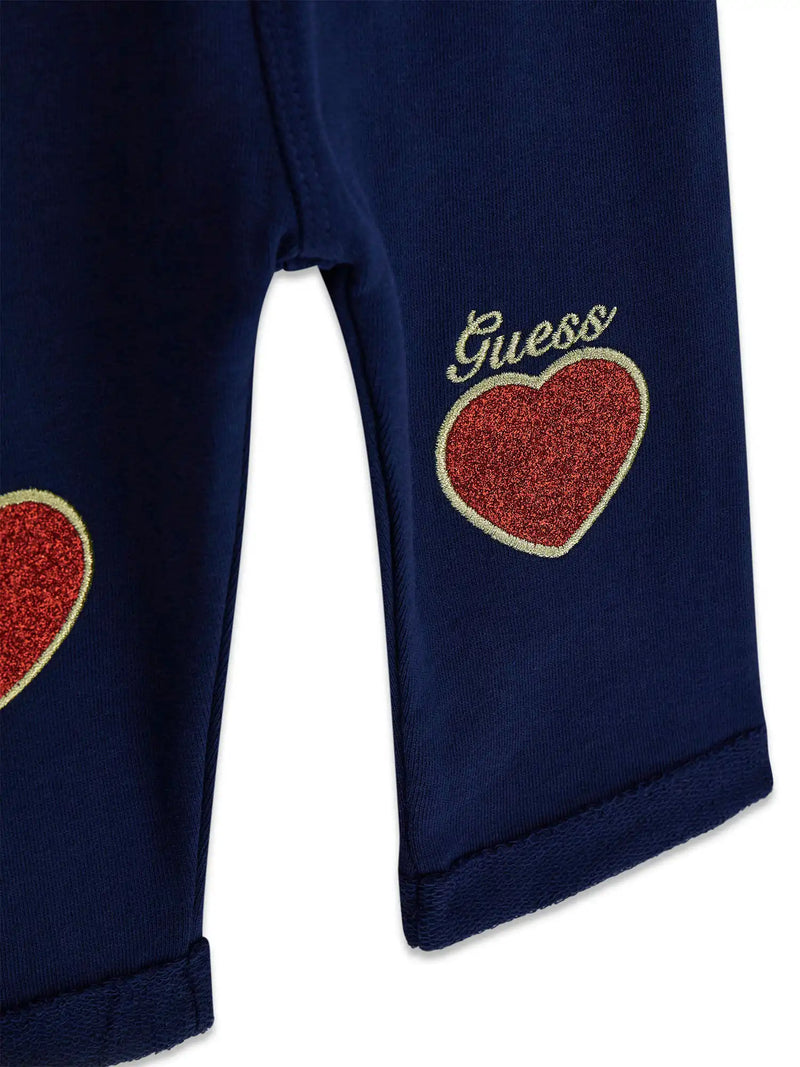 Closer look at the Guess glitter heart track bottoms.