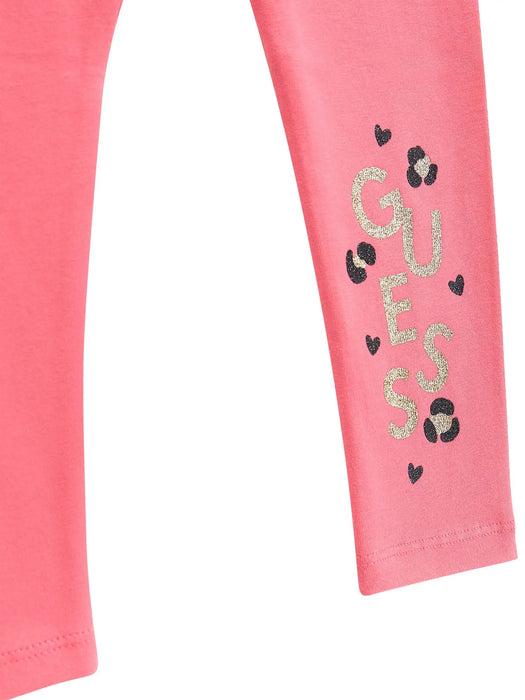 Guess pink leggings with glitter logo at the ankle.