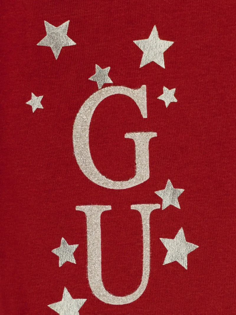 Closer view of the Guess glitter logo leggings.