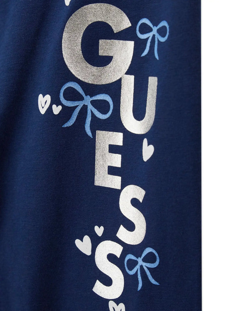 Closer look at the Guess logo leggings showing detail of the silver foil logo.