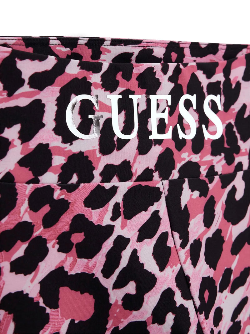 Closer look at the Guess leopard print leggings showing detail of the silver foil logo.
