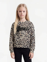Girl modelling the Guess leopard print sweatshirt.