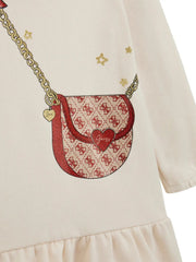 Closer look at the Guess long sleeve dress showing detail of the glittery handbag design.