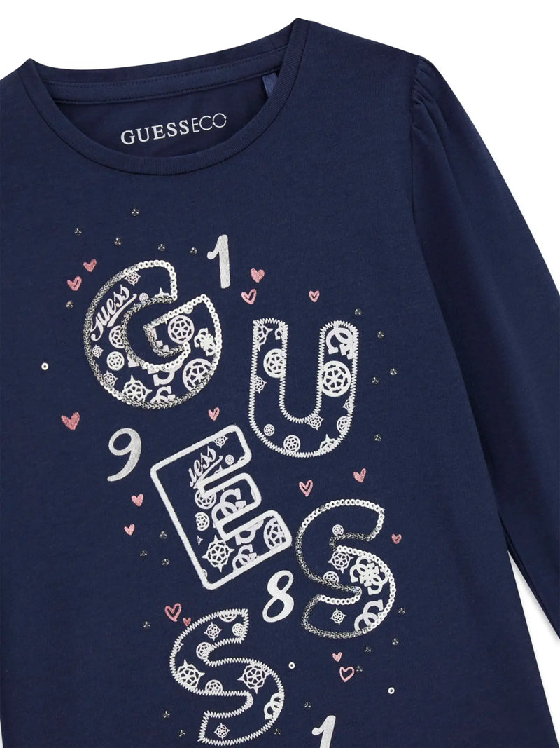 Closer look at the Guess long sleeve t-shirt showing detail of the silver sequin logo.