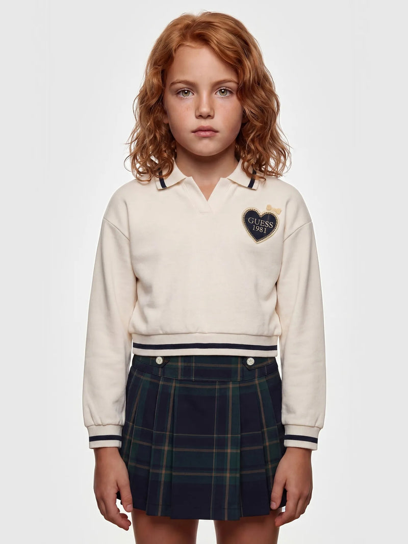 Closer view of the Guess plaid skirt set.
