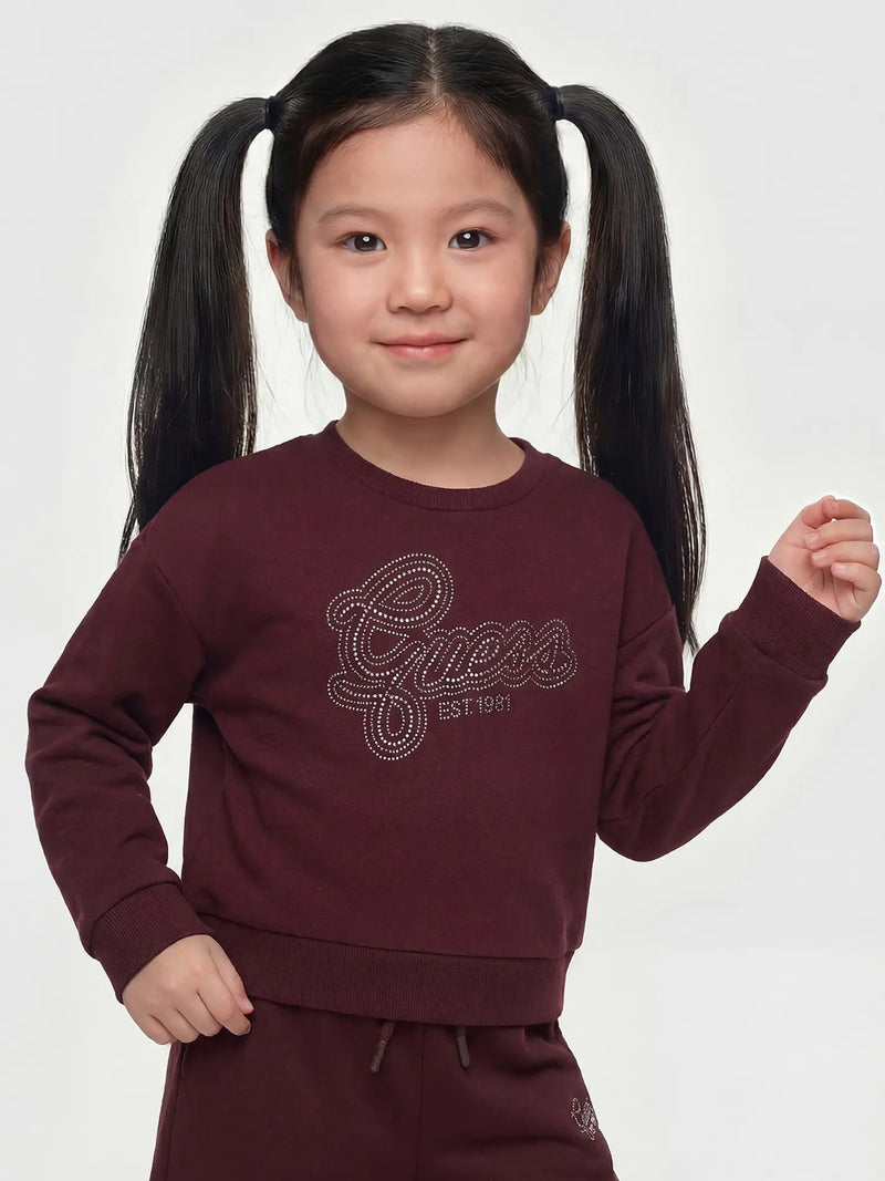 Guess girl's tracksuit with silver rhinestone logo.