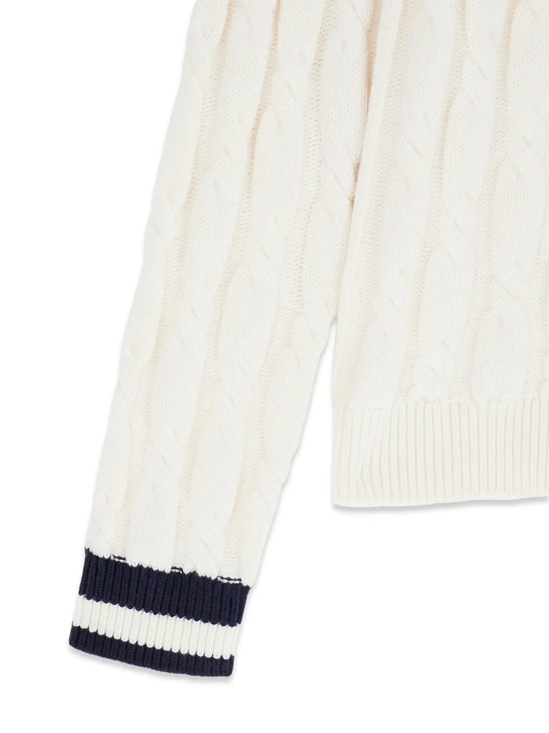 Guess cable knit sweater with contrasting navy stripes at the cuffs.