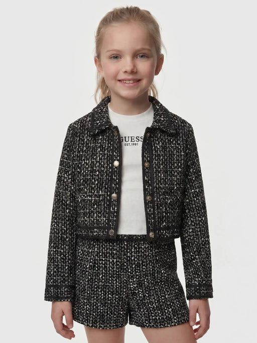Girl wearing the Guess tweed blazer.