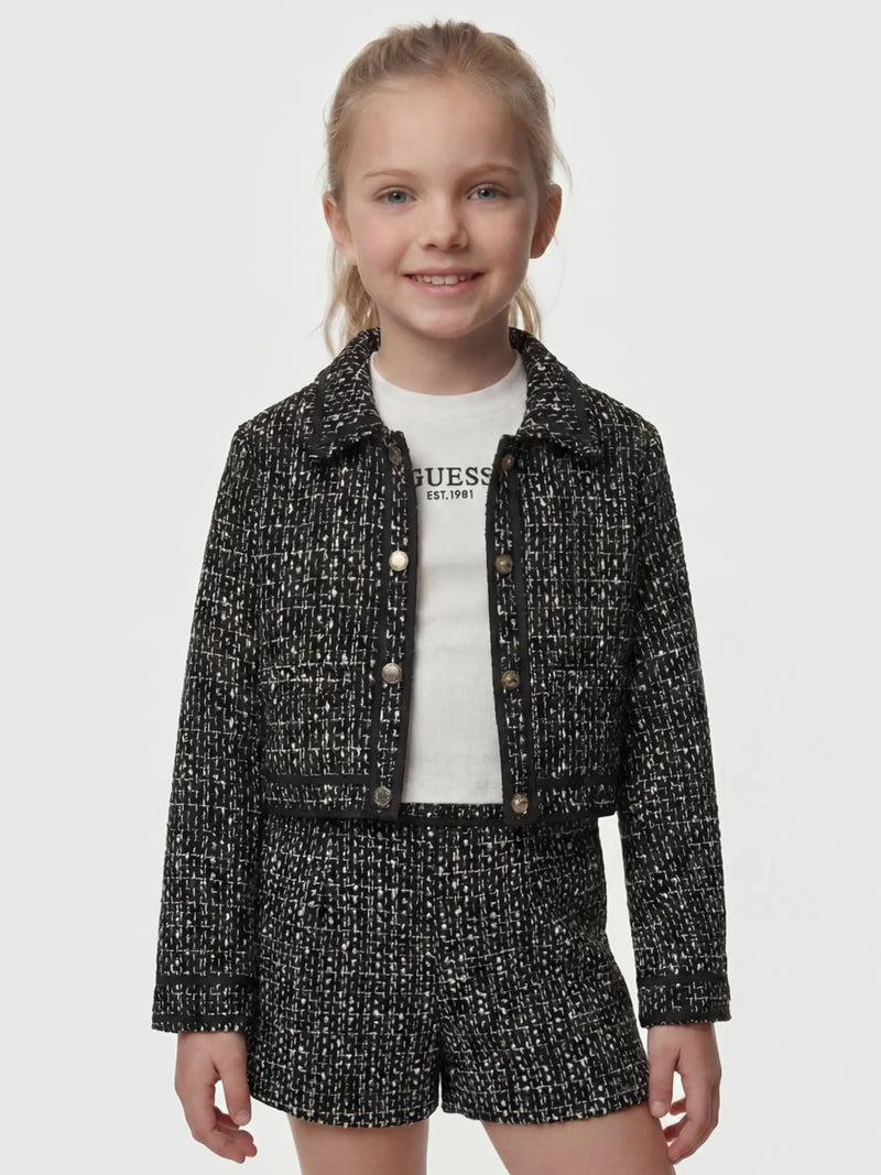 Girl wearing the Guess tweed blazer.