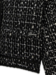 Closer view of the Guess tweed blazer.