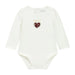 Baby girl's white bodysuit with red tweed heart on the chest.