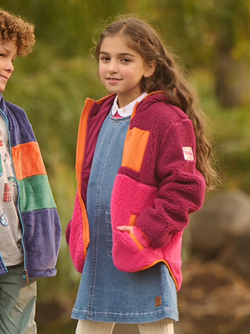 Girl modelling the Hatley colourblock sherpa jacket.