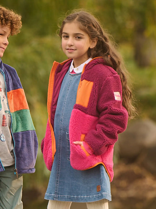 Girl modelling the Hatley colourblock sherpa jacket.