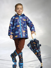 Boy wearing the Hatley colourful dinos raincoat.
