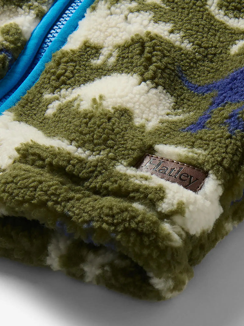 Hatley dino sherpa jacket with logo patch at the hem.