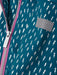 Hatley blue raincoat with logo badge on the sleeve.