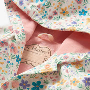 Hatley little garden chicks raincoat with pink inner lining.
