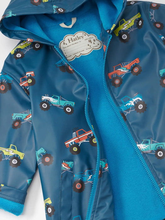 Hatley monster trucks raincoat with blue inner lining.