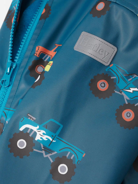 Hatley monster trucks raincoat with logo badge on the sleeve.