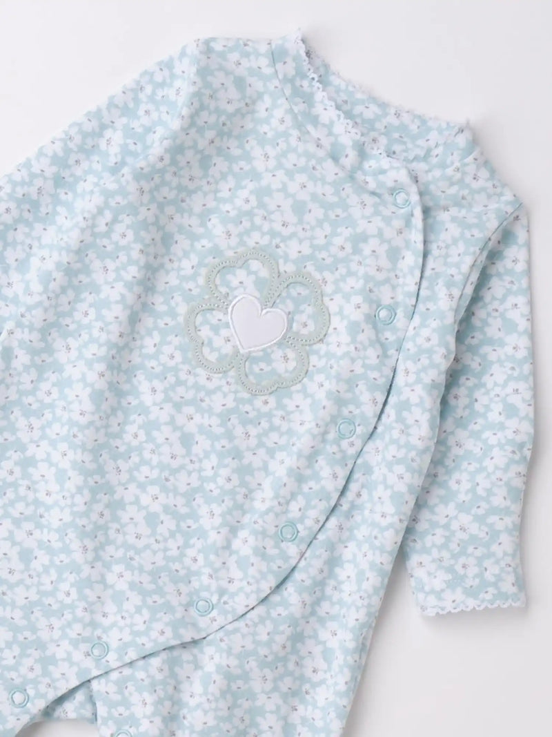 Closer view of the iDo floral print babygrow.