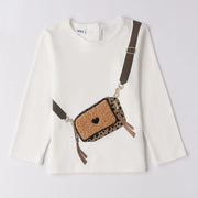 Girl's cream white long sleeve t-shirt.