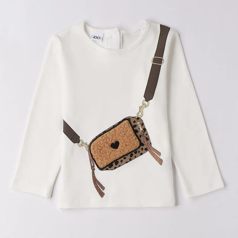 Girl's cream white long sleeve t-shirt.