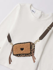 Closer view of the long sleeve t-shirt.