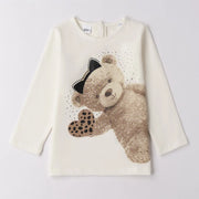 Girl's cream white long sleeve t-shirt.