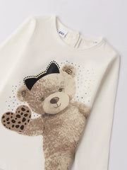 Closer look at the cream white t-shirt.