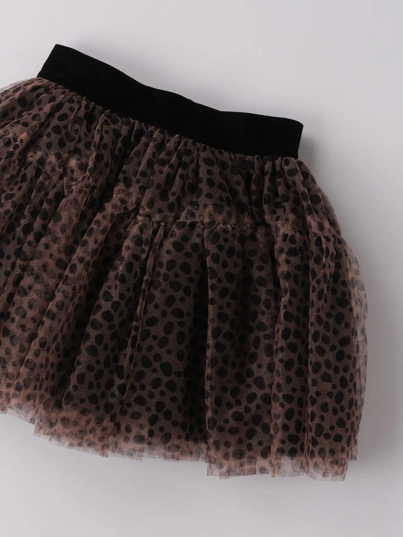 Closer view of the tulle mesh skirt with leopard print pattern.