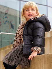 Girl modelling the iDo reversible puffer jacket.