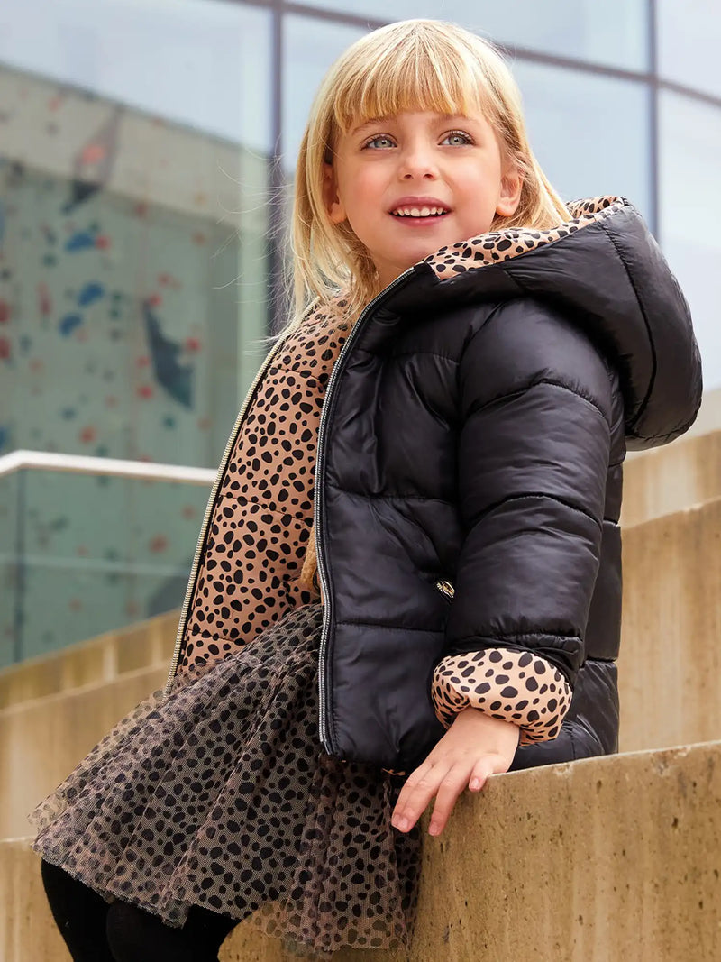 Girl modelling the iDo reversible puffer jacket.