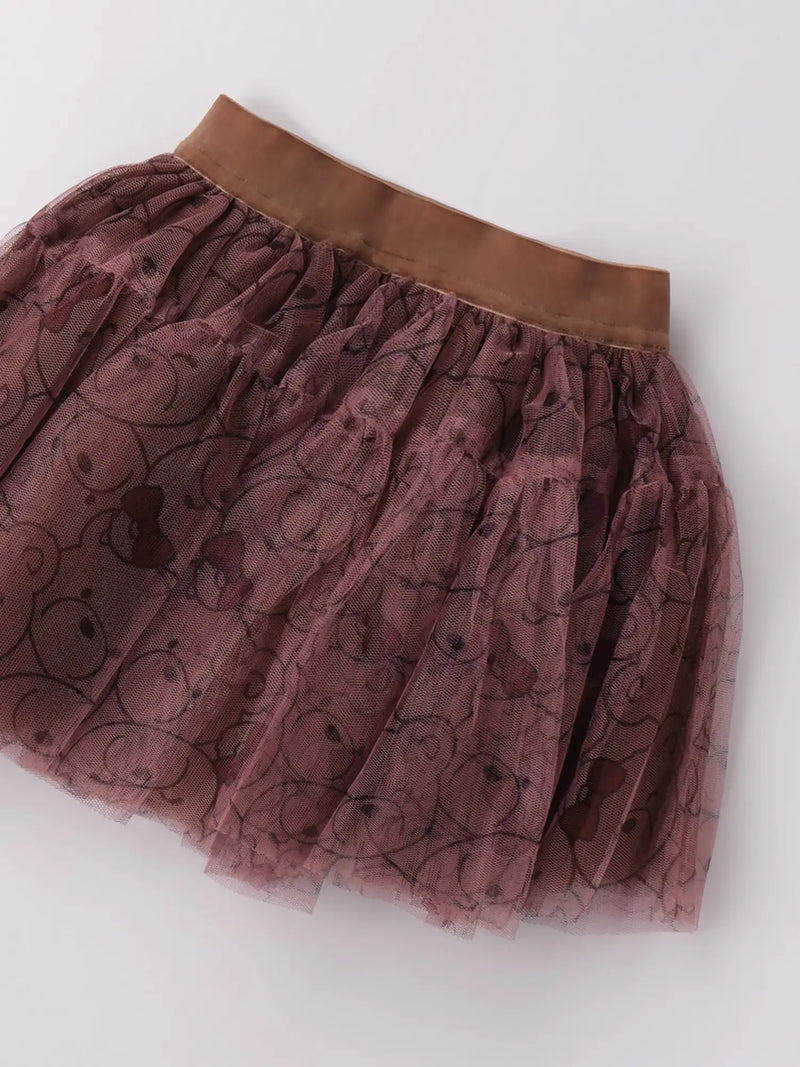 Closer view of the dusky pink tulle skirt.