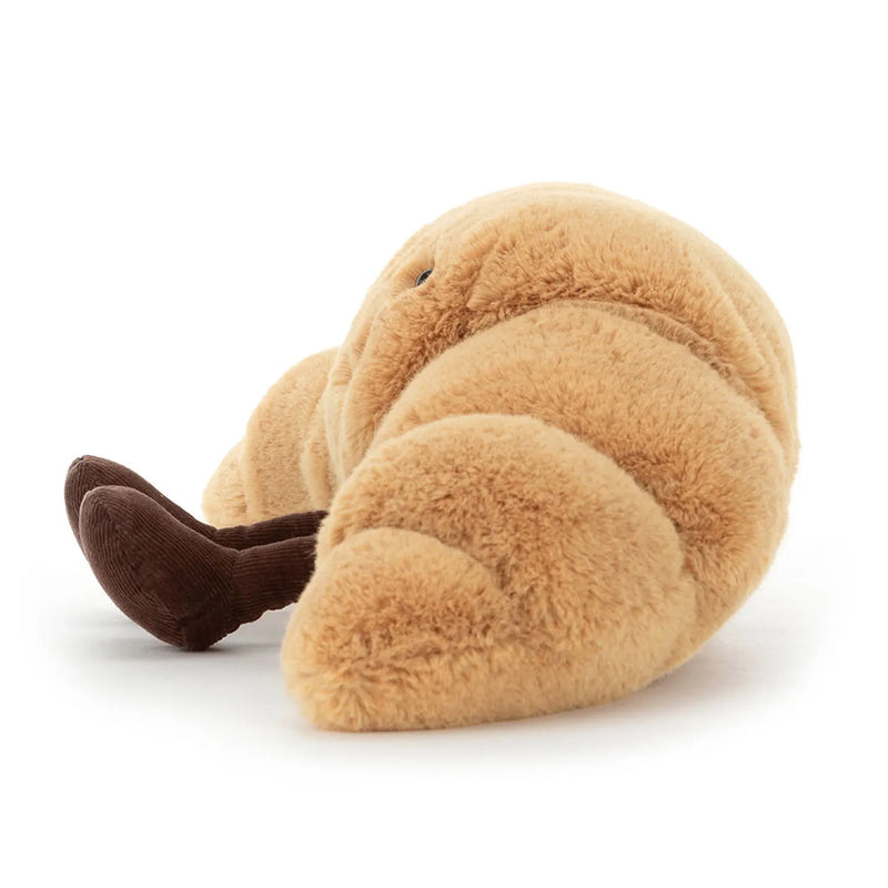 Side view of the Jellycat amuseables croissant.