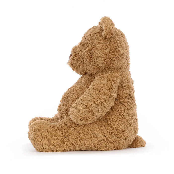 Side view of the Jellycat bartholomew bear.